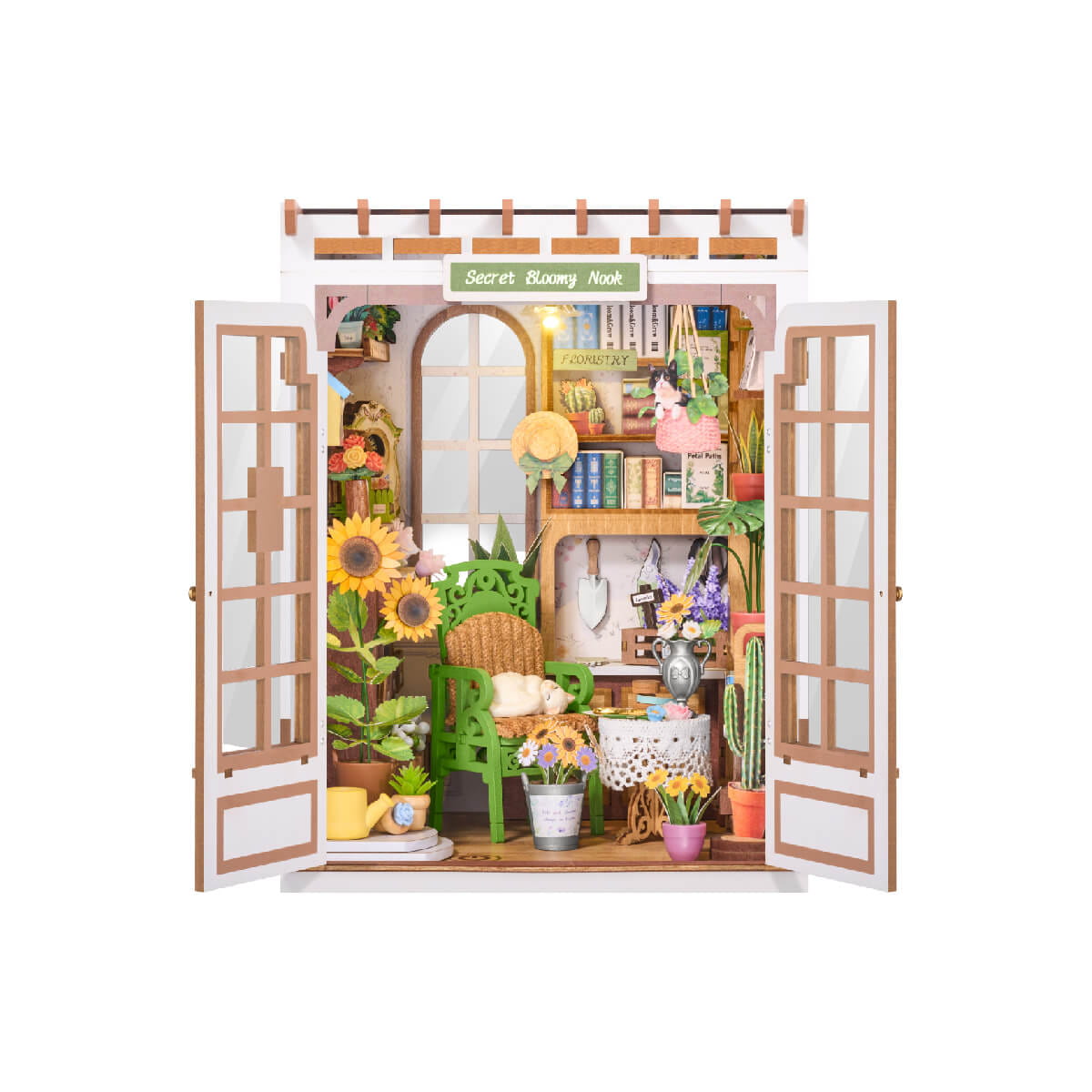 Miniature garden-themed room with open doors on a white background