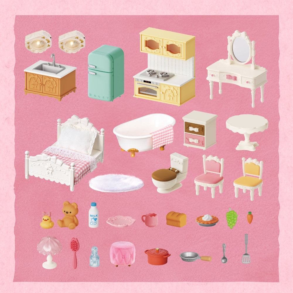 A collection of miniature dollhouse-style furniture and home accessories arranged on a pink background, including a bathroom vanity, retro refrigerator, stove, dressing table, bed, bathtub, toilet, chairs, table, pots, utensils, and small food and toy items.