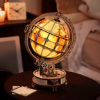 Decorative globe with glowing interior on a table