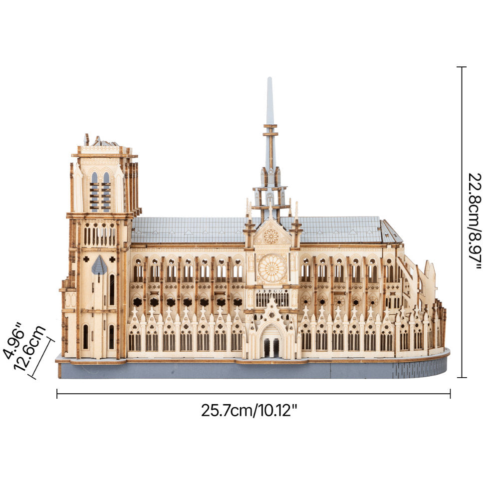 Wooden model of a cathedral with dimensions indicated on a white background