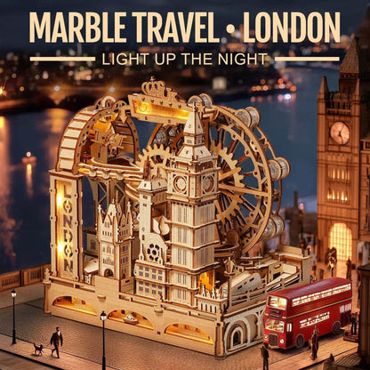 Marble travel model of London with Big Ben and a red bus, set against a cityscape background.