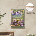 Decorative wall art with floral design and wooden bridge on a beige wall.