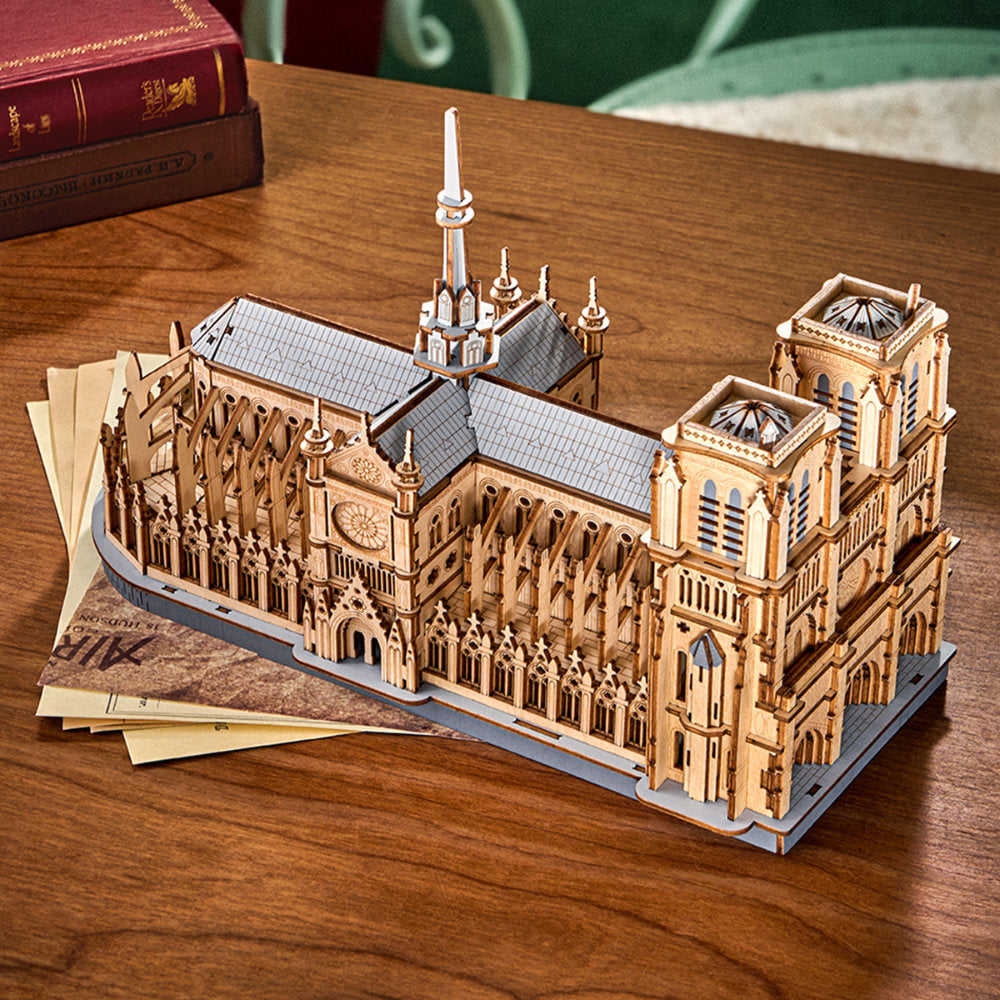 Wooden model of a cathedral on a wooden table