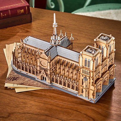 Wooden model of a cathedral on a wooden table