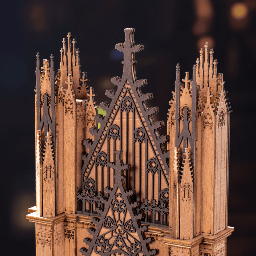 Gothic architectural model with intricate details on a dark background