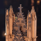 Gothic architectural model with intricate details on a dark background