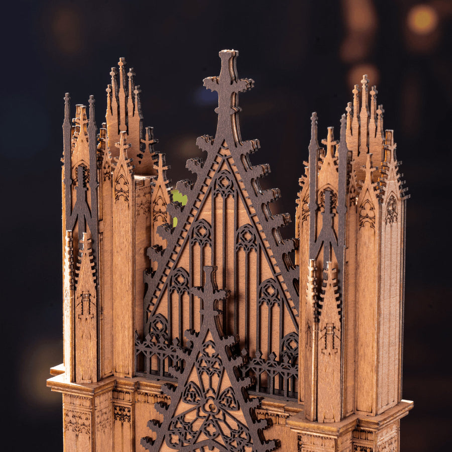 Gothic architectural model with intricate details on a dark background