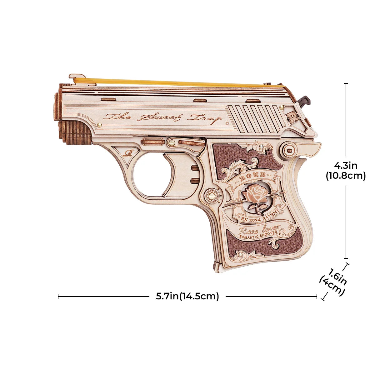 Wooden gun model with intricate details and measurements on a white background