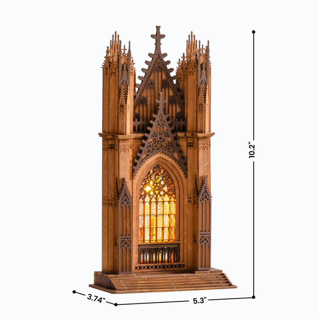 Gothic-style wooden model with stained glass window and dimensions on a white background