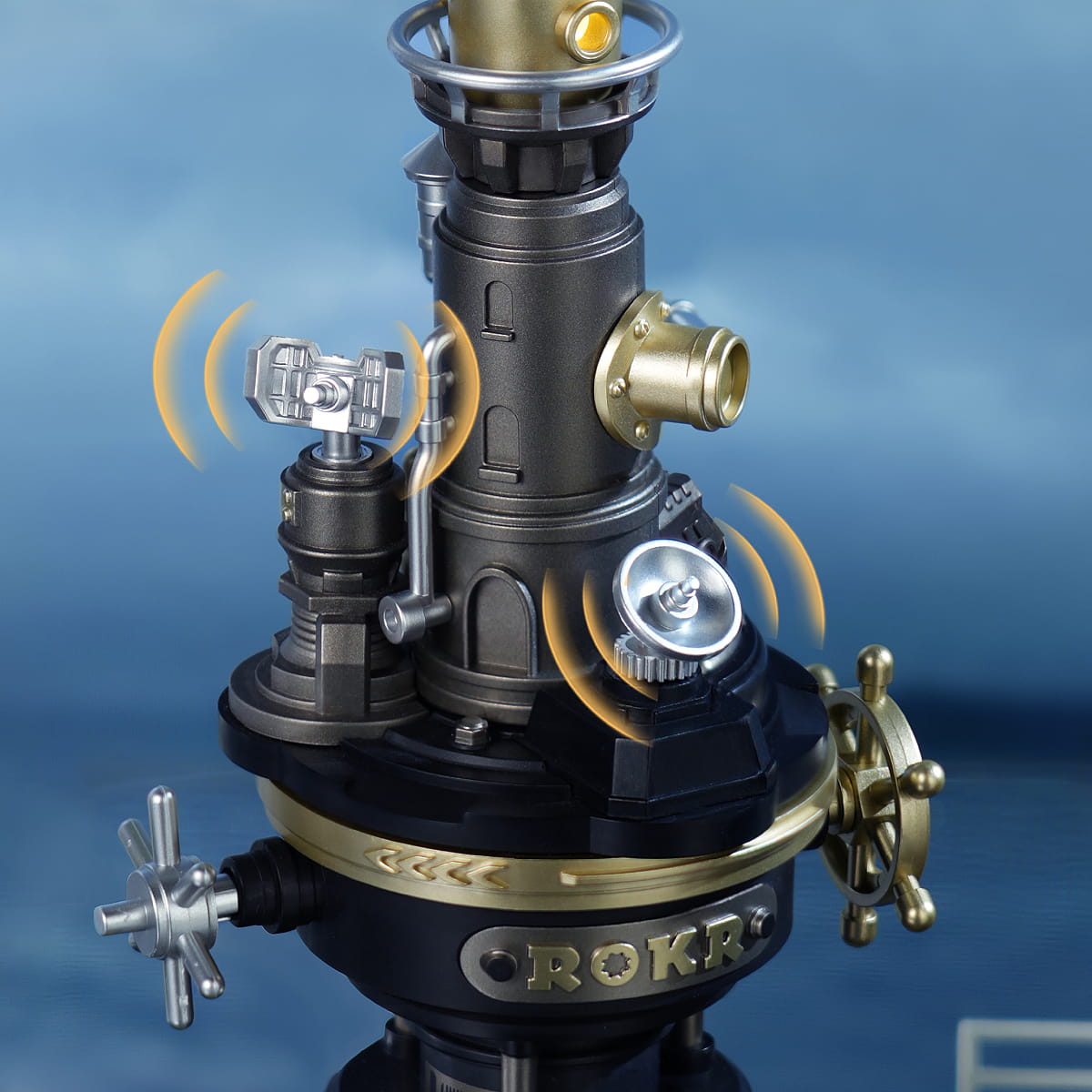 Close-up of a mechanical device with 'ROKR' branding on a blue background