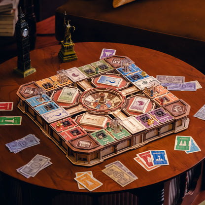 A complex 3D wooden model board game resembling a city or transit system, displayed on a round wooden table with various colorful game cards and miniature structures around it.