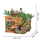 A miniature coffee shop DIY model kit shown with dimension lines and measurements (29cm x 26cm x 23cm) on a plain white background.