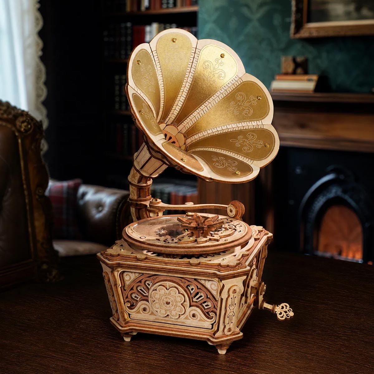Vintage-style gramophone on a wooden surface with a blurred background