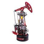 Model of a mechanical oil pumpjack on a white background