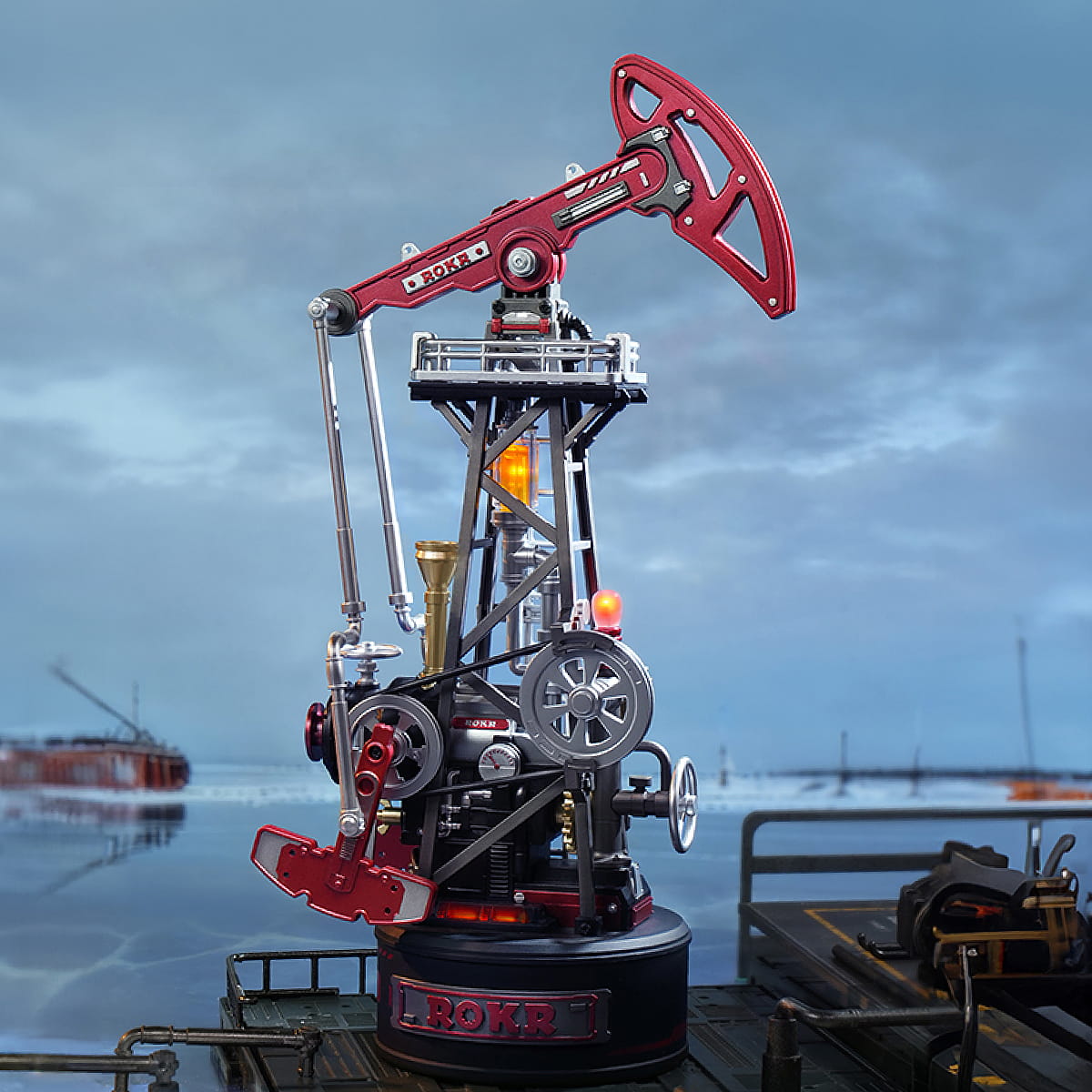 Model of an oil pumpjack with a blurred industrial background