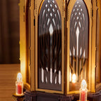 Wooden-Town Angel's Christmas Pyramid 3D wooden puzzle music box – close-up of lattice-cut arched panels with electronic candles at the base
