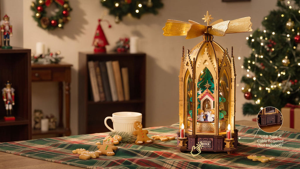 Wooden-Town Angel's Christmas Pyramid 3D wooden puzzle music box – pyramid on a festive table in a living room decorated for Christmas