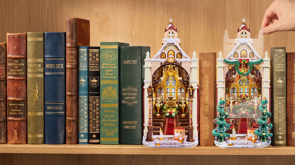 Wooden-Town Caroling Cathedral 3D wooden book nook kit – Christmas and everyday decoration looks side by side between books on a shelf