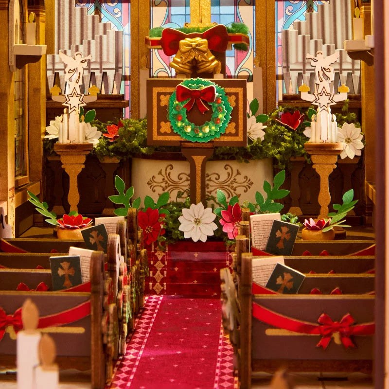 Wooden-Town Caroling Cathedral 3D wooden book nook kit – close-up of the altar with wreath, organ pipes, red carpet and pews