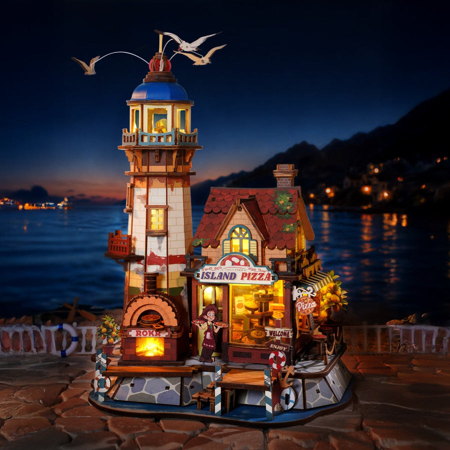 Wooden-Town Chillbay Pizzeria Music Box Kit – glowing with LED lights at night