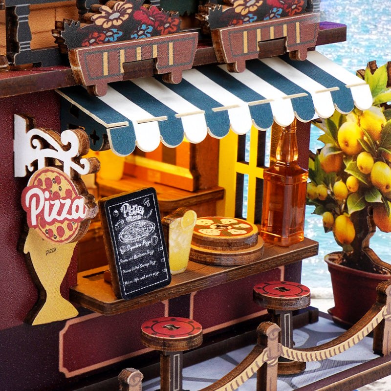 Wooden-Town Chillbay Pizzeria Music Box Kit – outdoor dining under the striped canopy