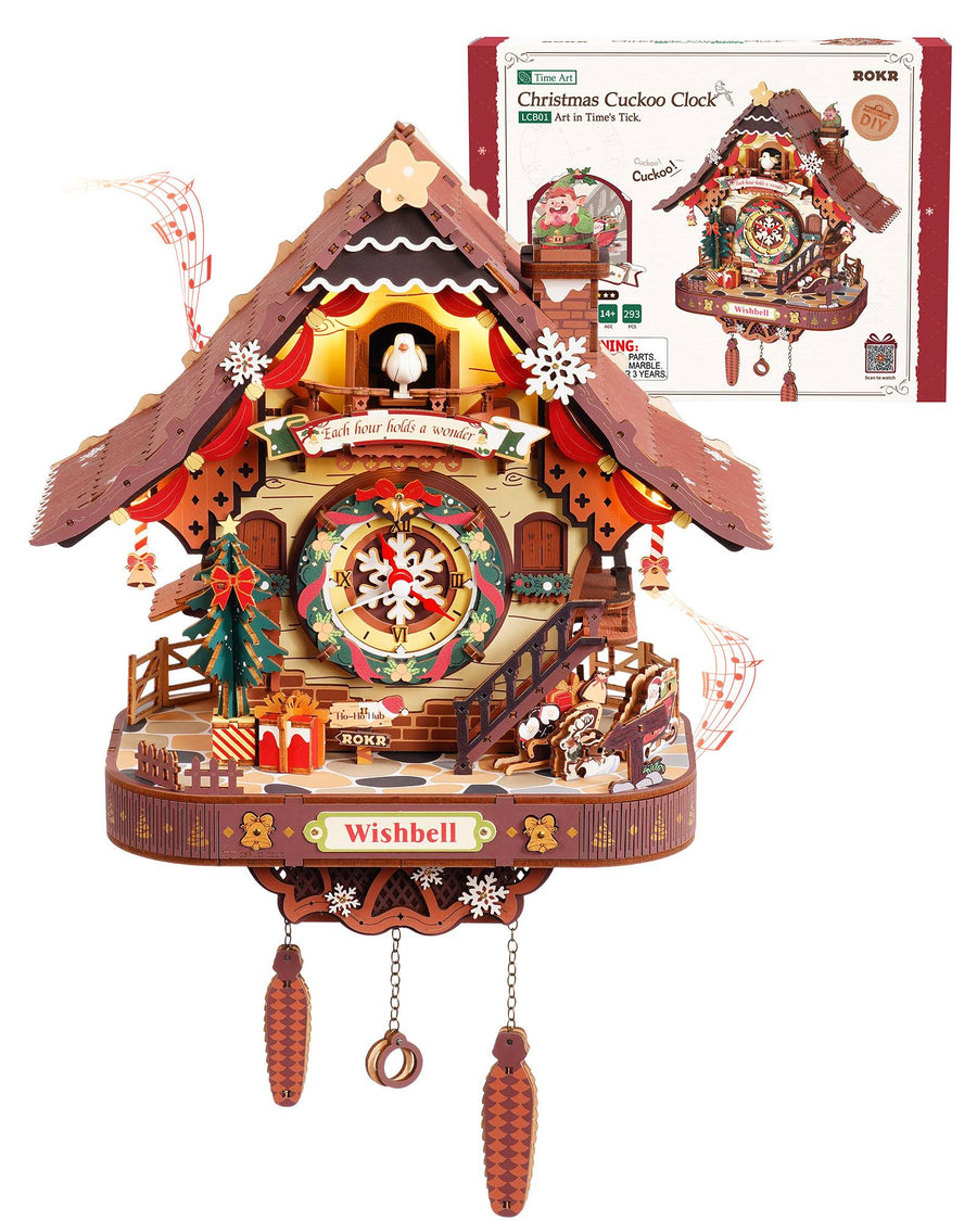 Wooden-Town Christmas Cuckoo Clock 3D wooden puzzle kit – angled view of the clock with music notes and the kit box