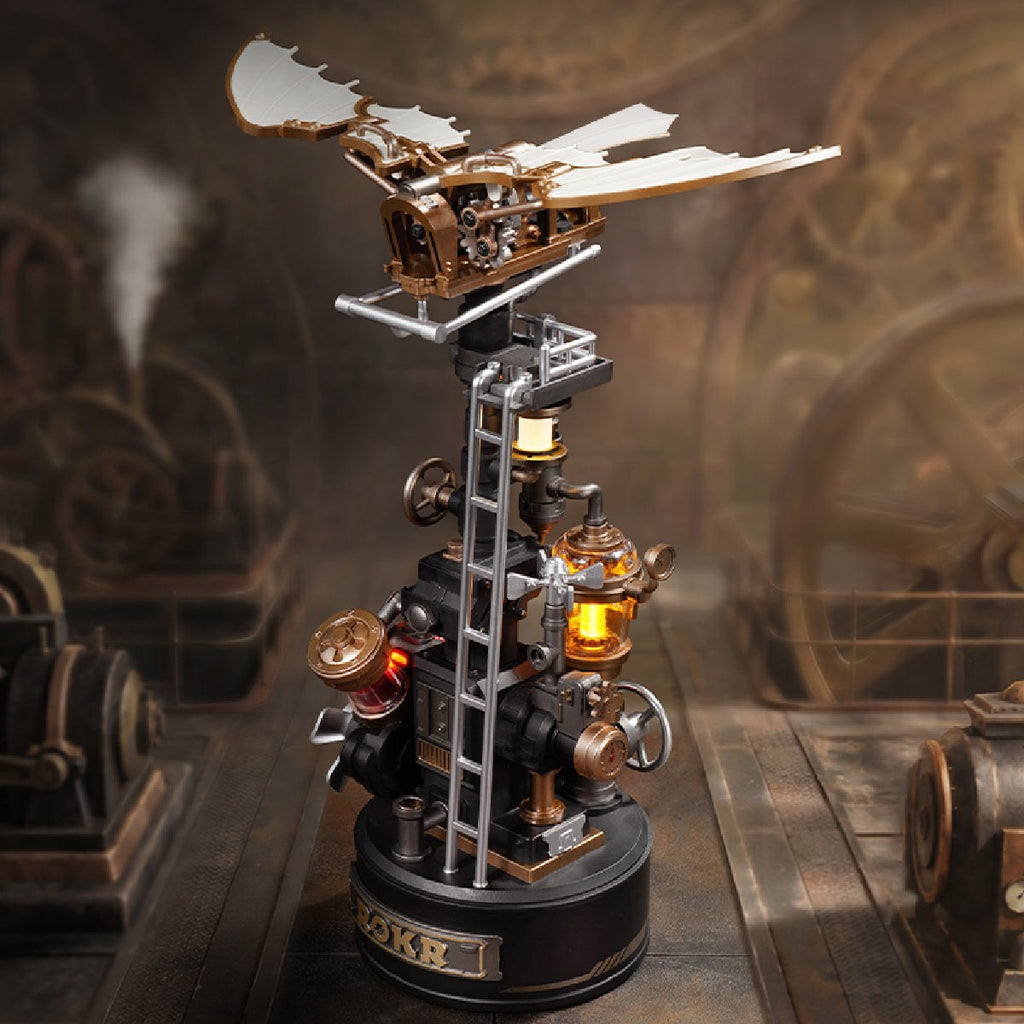 Wooden-Town Da Vinci's Ornithopter mechanical model kit – model with glowing lamp in a steam-filled industrial workshop setting