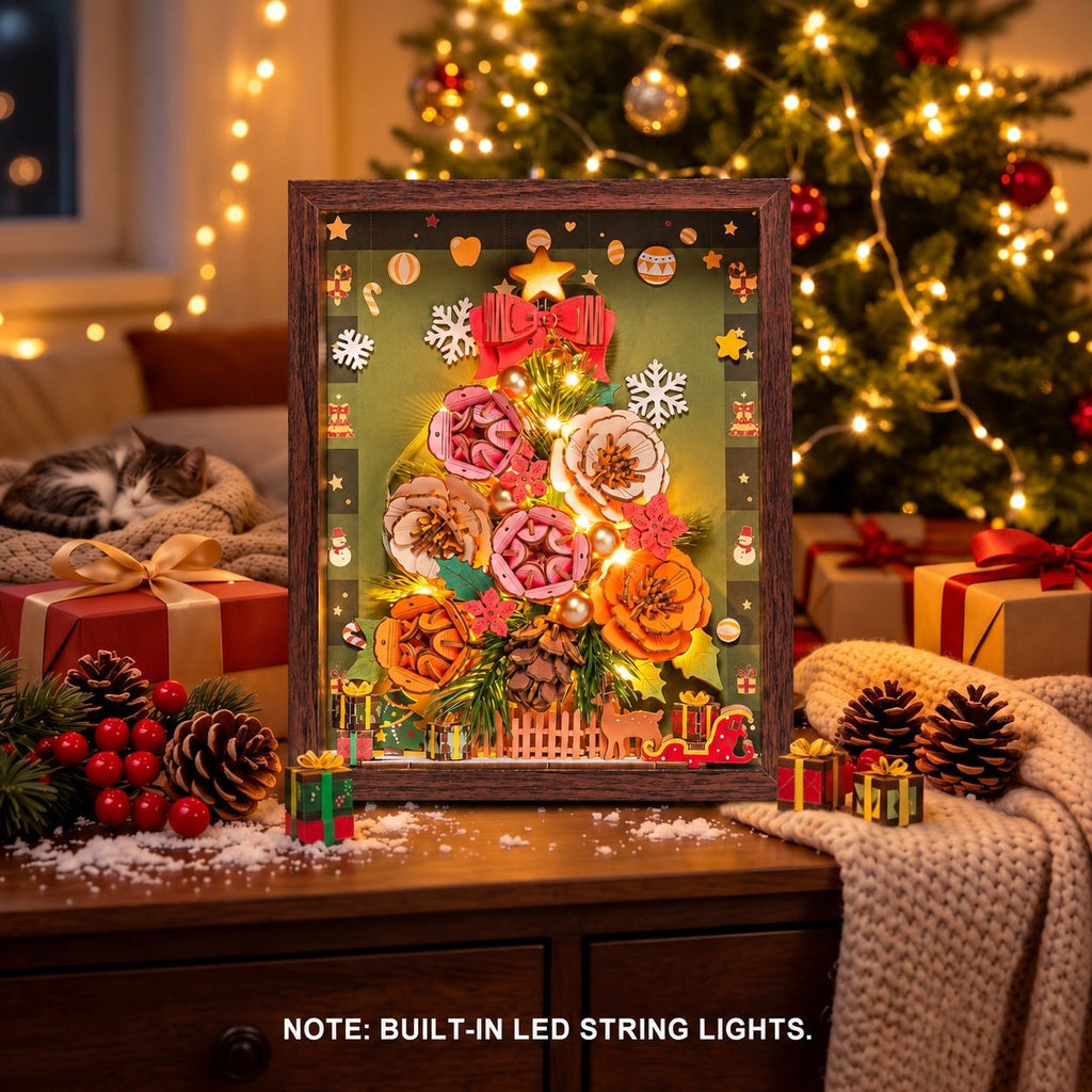 Wooden-Town Everglow Christmas Tree 3D puzzle kit – lit frame on a table with gifts and pine cones in front of a Christmas tree