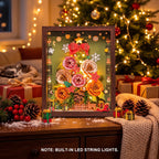 Wooden-Town Everglow Christmas Tree 3D puzzle kit – lit frame on a table with gifts and pine cones in front of a Christmas tree