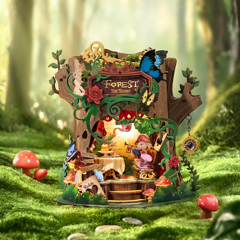 Wooden-Town Forest Tea Party Music Box Kit – glowing on a mossy forest floor