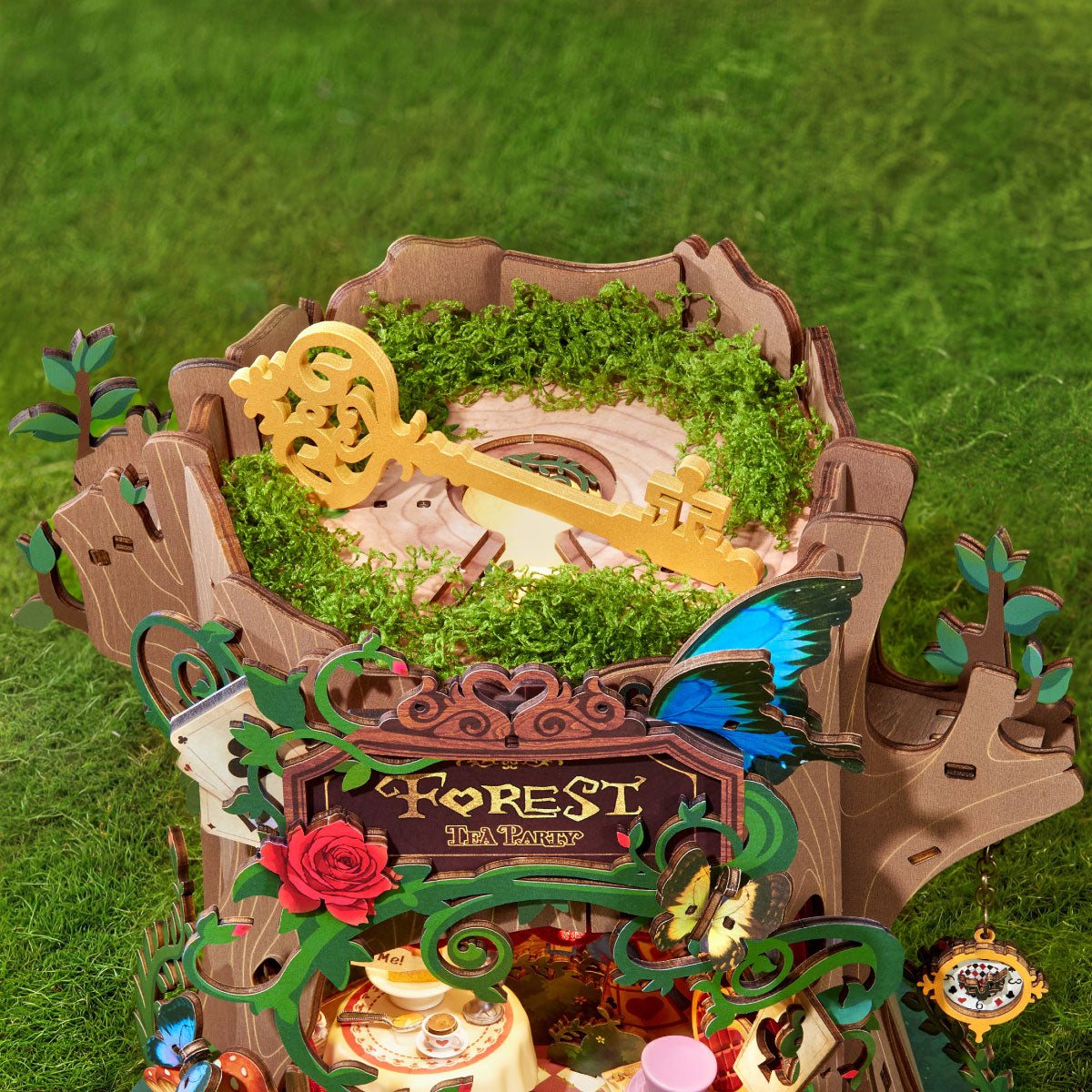 Wooden-Town Forest Tea Party Music Box Kit – golden key and moss on top of the tree