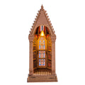 Gothic-style model with stained glass window on a white background