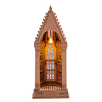 Gothic-style model with stained glass window on a white background