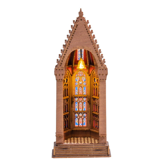 Gothic-style model with stained glass window on a white background