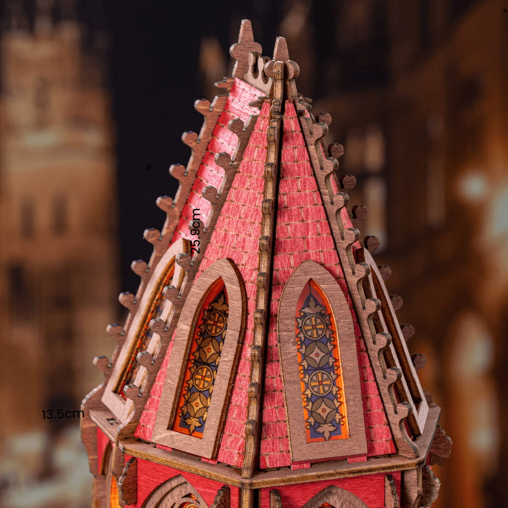 Detailed model of a red and brown architectural structure with intricate designs.