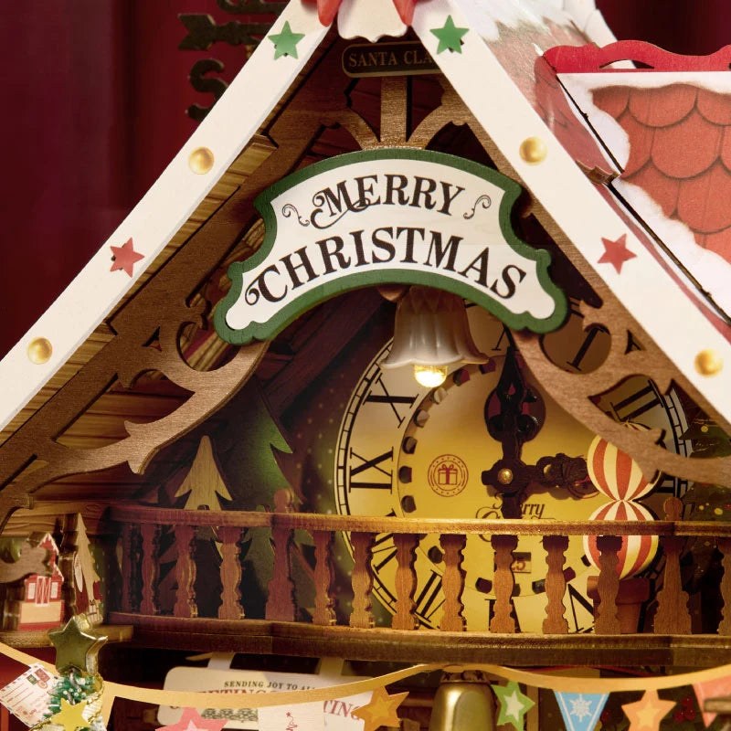 Wooden-Town Polaris Post DIY miniature house kit – close-up of the roof gable with Merry Christmas sign and countdown clock