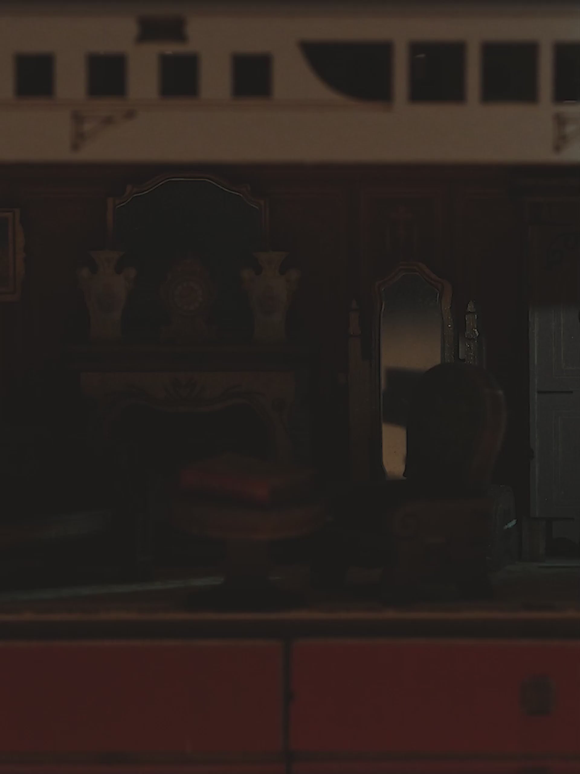 Model of the Titanic with interior lights on a white background